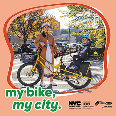 A woman stands next to her bicycle while her young daughter sits in the child seat on the back of the bicycle. Text overlay reads my bike my city with New York City agency logos.