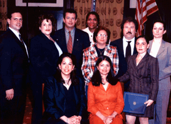 (l to r standing): Robert Acquista, Supervisor - BK5; Debra Barreto, Community Affairs/DSNY Language Liaison; Albert Durrell, Deputy Chief - Cleaning Operations; Perla Beckford, Clerical Associate III - Brooklyn Borough Office; Cecilia Diaz, Office Associate - Legal Affairs; Mano Napolitano, Community Coordinator - Community Affairs - CCU; Maria Montalvo, Computer Associate - B.C.C.; Stavroula Korkokios, Clerical Associate III - Equipment Office. From the Mayor's Office (l to r sitting): Carol Robles-Roman, Deputy Mayor - Legal Affairs and Sayn V. Bhojwani, Commissioner - Immigrant Affairs
