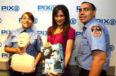 EMTs Pablo Vazquez and Jessica Smith with WPIX's Lisa Mateo.