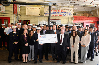 Members of Engine 298/Ladder 127 joined officials from the Fireman's Fund and HUB International Northeast at the ceremony on Sept. 3.