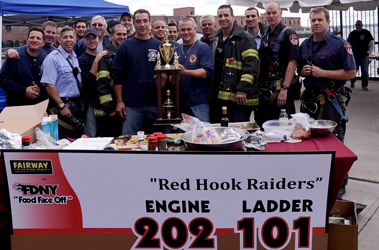 All of the competitors joined the firefighters from Engine 202/Ladder 101 with the winning trophy.