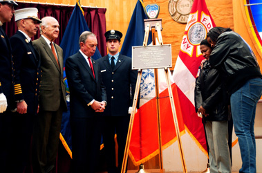 Mayor Michael Bloomberg, Fire Commissioner Nicholas Scoppetta, Chief of Department Salvatore Cassano, FDNY Chaplain Rev. Stephen Harding and a ceremonial officer stand with Probationary Firefighter Jamel M. Sears' mother, Jonnie, and sister, Charmaine, as a memorial plaque is dedicated in the firefighter's honor.