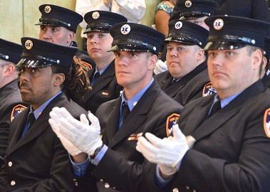 (L to R, front row) Newly promoted lieutenants Ian Bradshaw-Dubin, Gregg Brady, and James Cavaliere during the promotion ceremony.