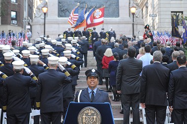 Firefighter Regina Wilson sings the National Anthem at FDNY Memorial Day.