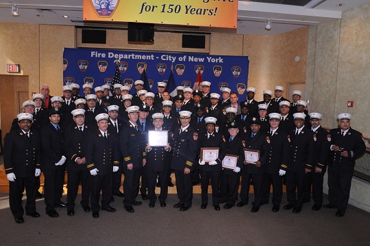 Chief of Fire Prevention Ronald R. Spadafora with the 28 award recipients