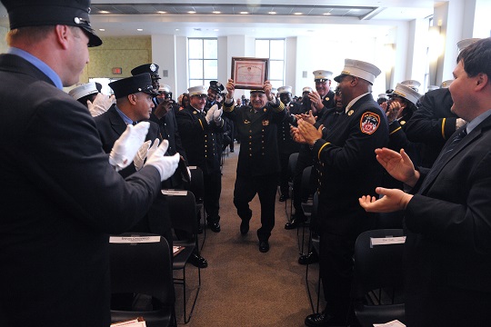 Chief Of Fire Prevention Ronald R. Spadafora celebrates the Bureau award