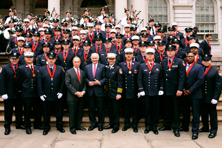 Mayor Michael Bloomberg, Fire Commissioner Nicholas Scoppetta and Chief of Department Salvatore Cassano joins the FDNY Medal Day winners on the steps of City Hall on June 4.