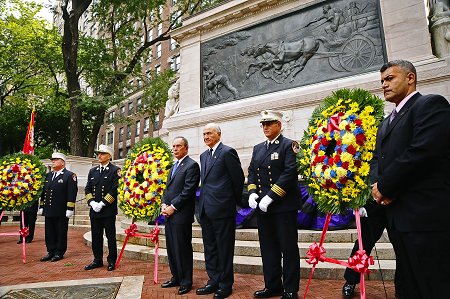 Mayor Michael Bloomberg, Fire Commissioner Nicholas Scoppetta, Chief of Department Salvatore Cassano, Chief of Operations Patrick McNally and Chief of EMS John Peruggia lay three wreaths at the Firefighter�s Memorial Monument in honor of the fire and EMS members who have died in the last year.