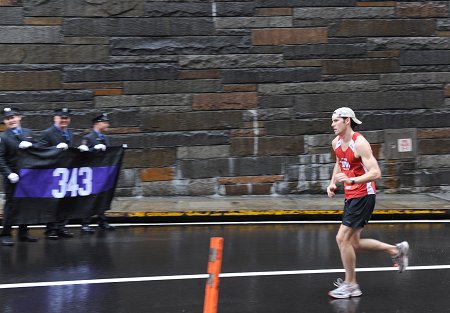 Firefighter exits the Brooklyn Battery Tunnel as he finishes the annual Stephen Siller Tunnel to Towers Run