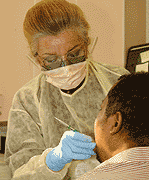 Photo of Dentist and Patient