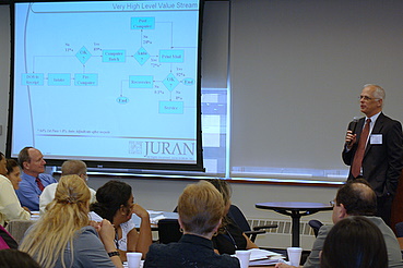 John Early speaking to workshop participants.