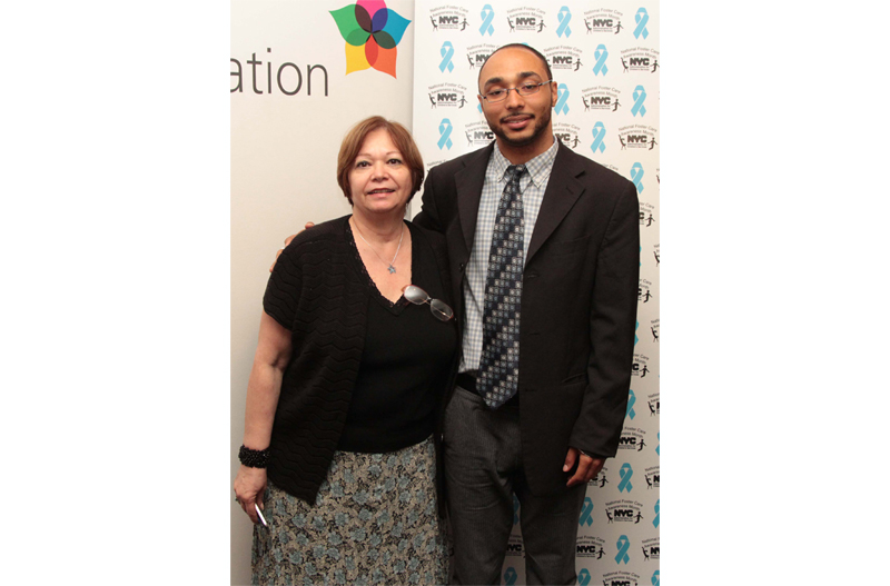 Commissioner Gladys Carrión with a foster parent at the event