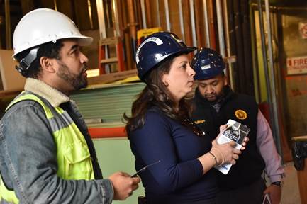 Photos of Commissioner La Rocca and DOB staff visiting one of the 1,000 construction sites