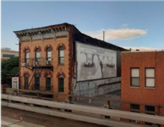 Photo of illegally a buildings displaying an advertising sign without a permit.