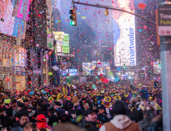 New Year’s Eve crowd celebrating with confetti
                                           