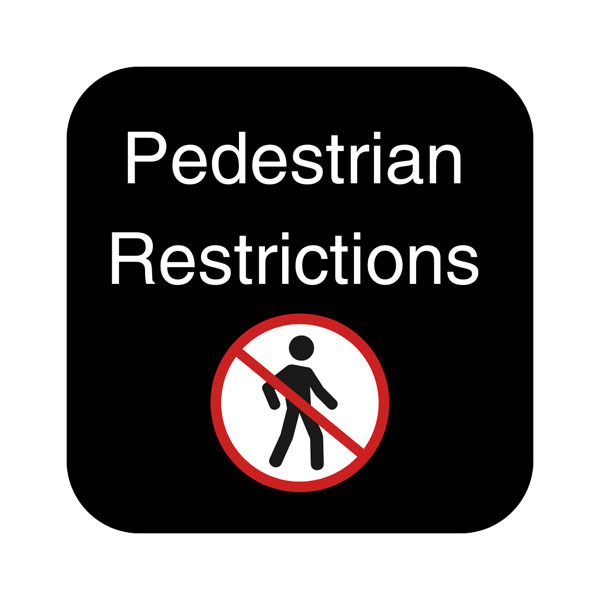 Black button with Pedestrian Restrictions text; icon of no walking sign