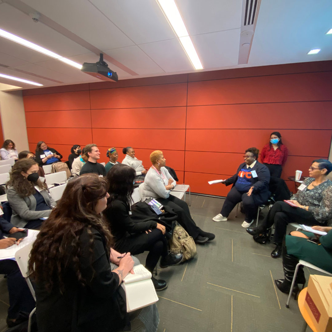 a group of people at hearing event