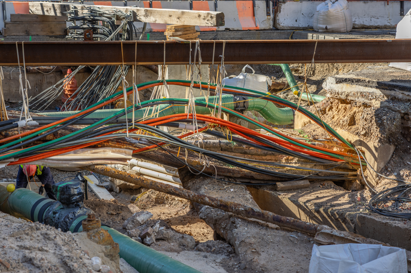 Utility lines within excavated trench