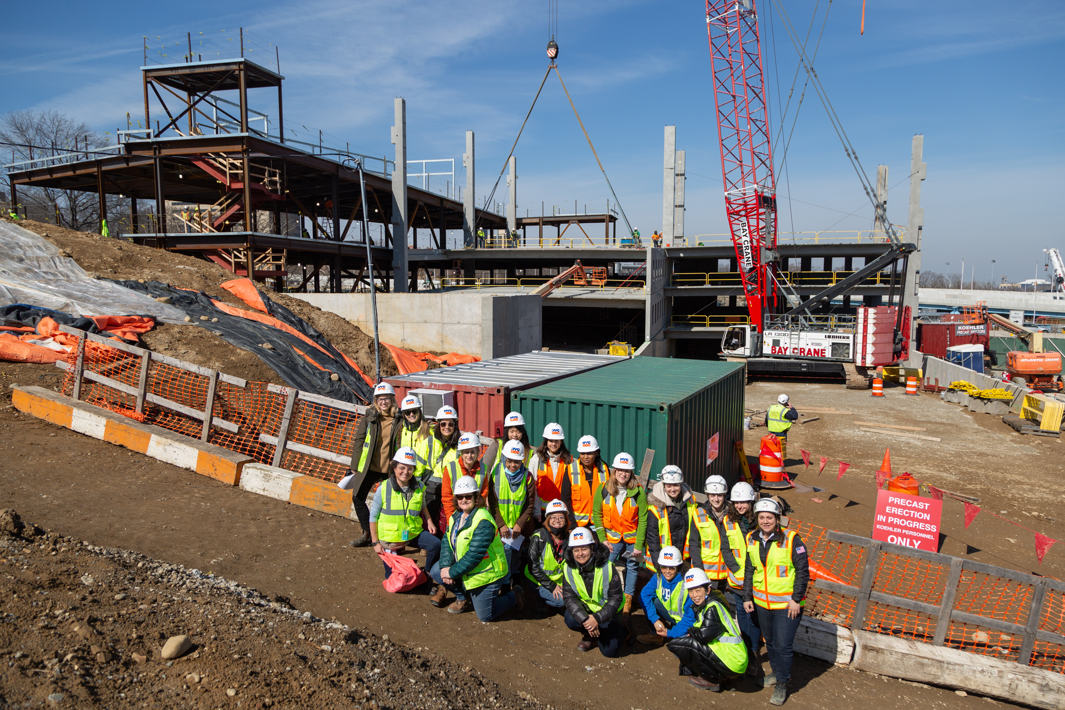 DDC staff pose for group photo at construction site