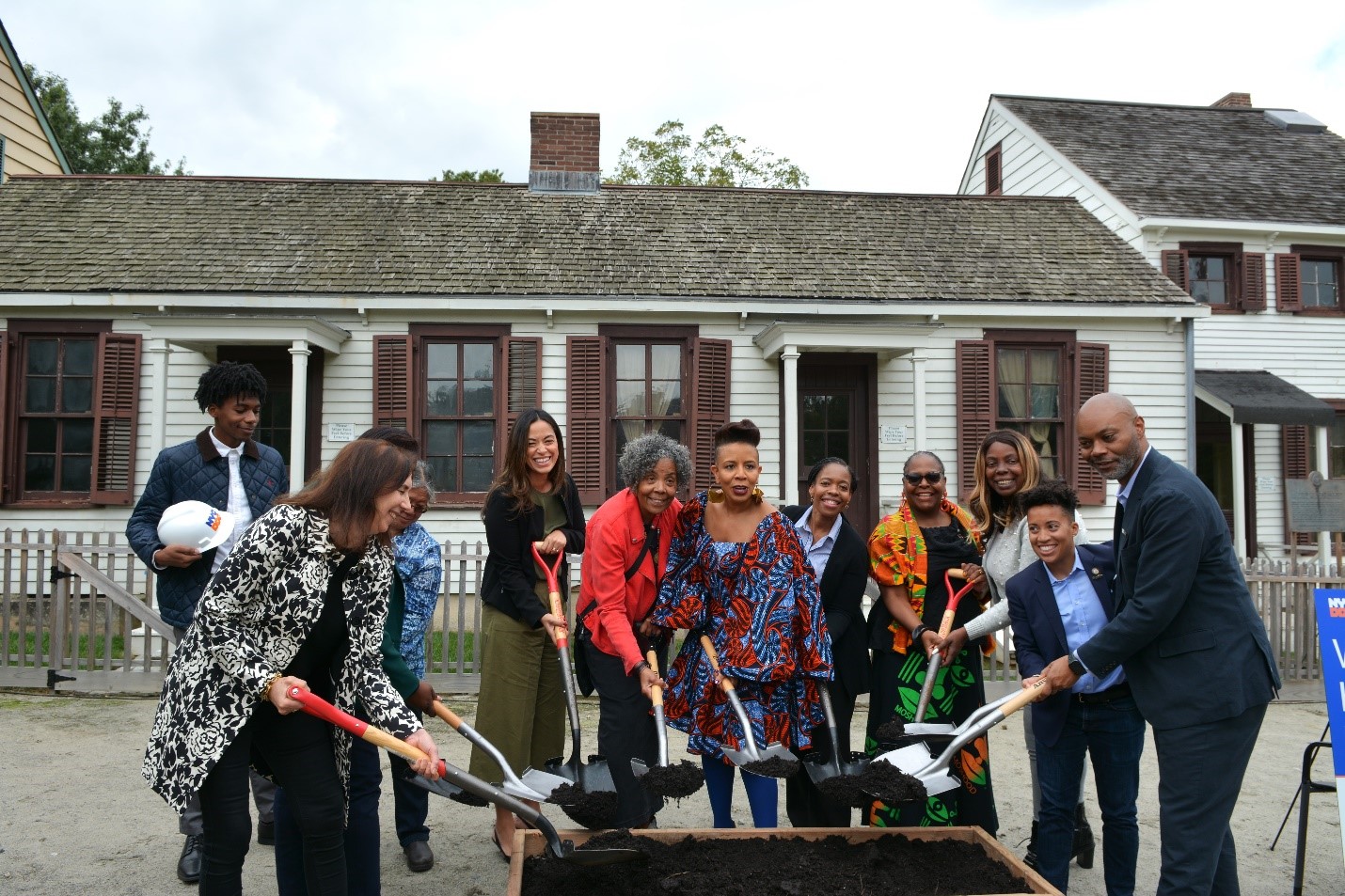 elected officials and city officials breaking ground alongside others