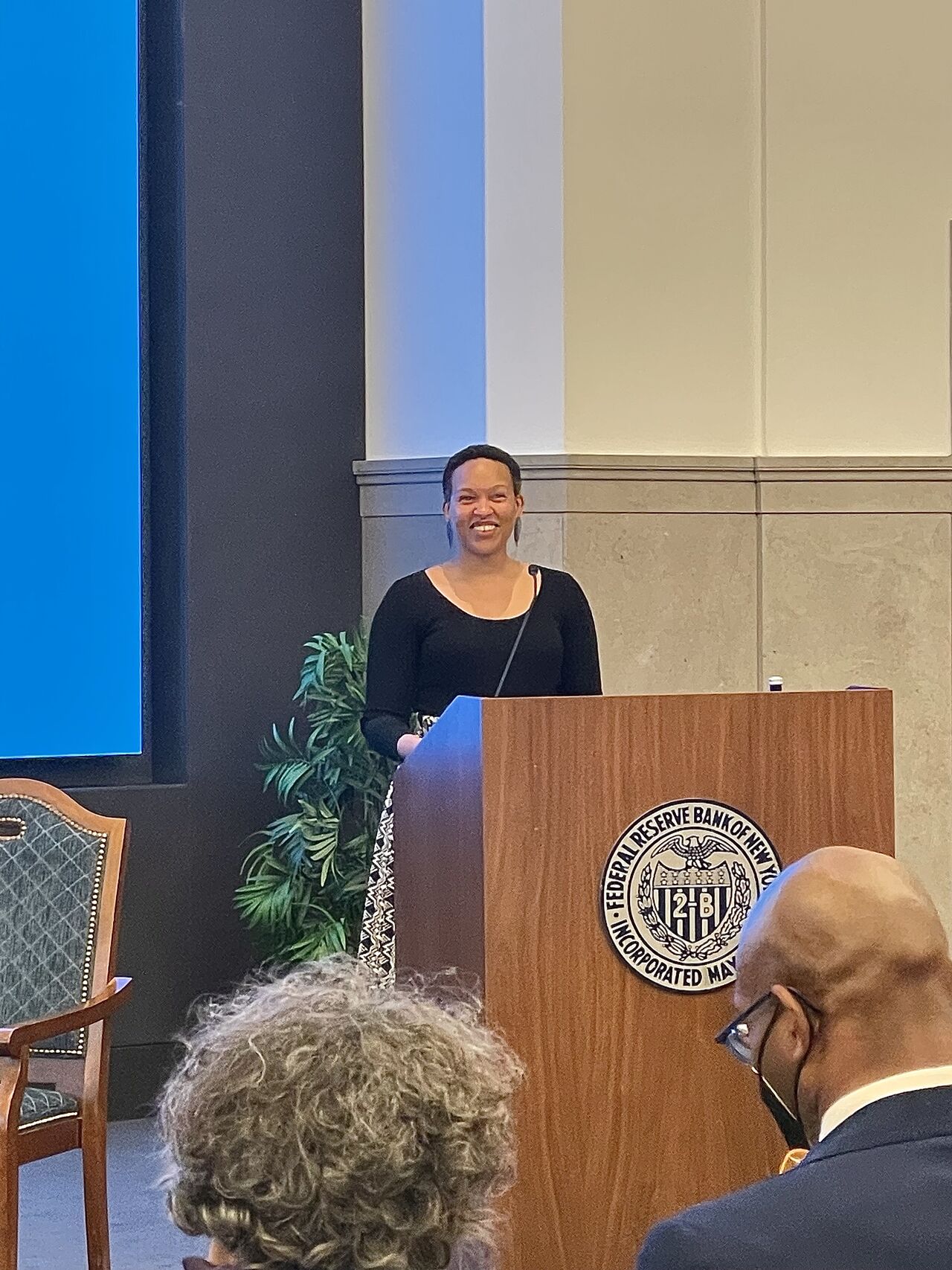 Dr. Michelle Morse speaks at the podium.