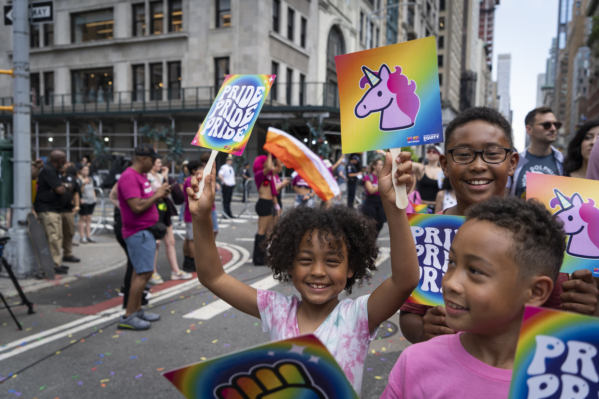 Midtown Pride Attendees celebrate with Mayor's Office of Equity and Unity Project Fans