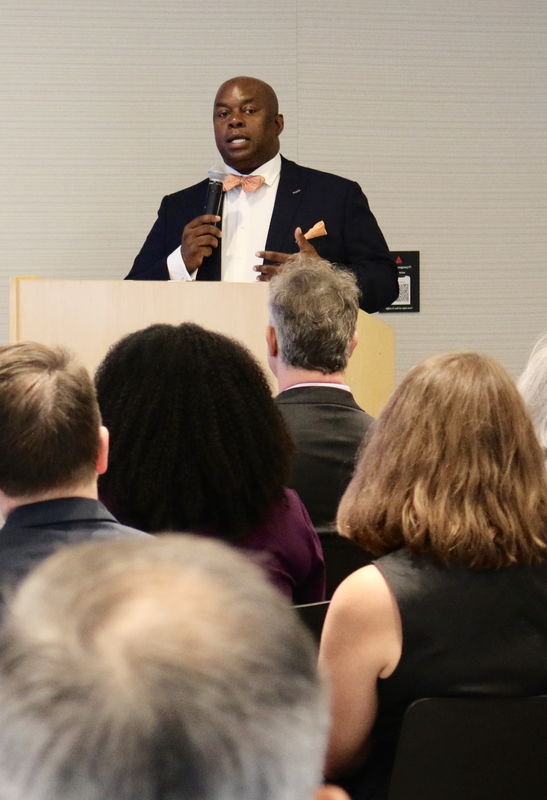 Richard Buery, CEO of Robin Hood, welcoming attendees and panelists at his organization's Deep Dive Event. 