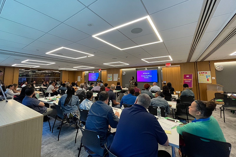 a room full of people participating in the racial equity planning.