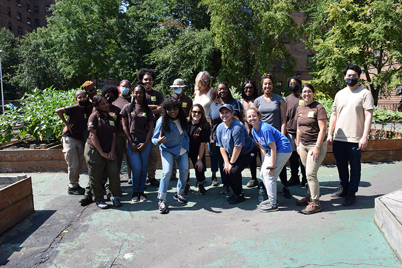 NYC Mayor's Office of Equity and Green City Force Members stand together for a photo.