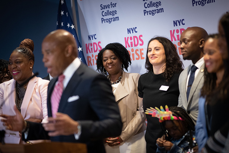 Commissioner Sideya Sherman, the Mayor's Office of Equity, looks on as Mayor Eric Adams gives remarks.