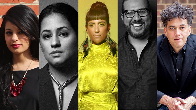 Woman wearing a black shirt and red necklace, woman wearing a black blazer and silver necklace, woman wearing yellow dress and peacock feather earrings, smiling man with glasses and collared shirt, curly haired man with blazer and crossed hands.