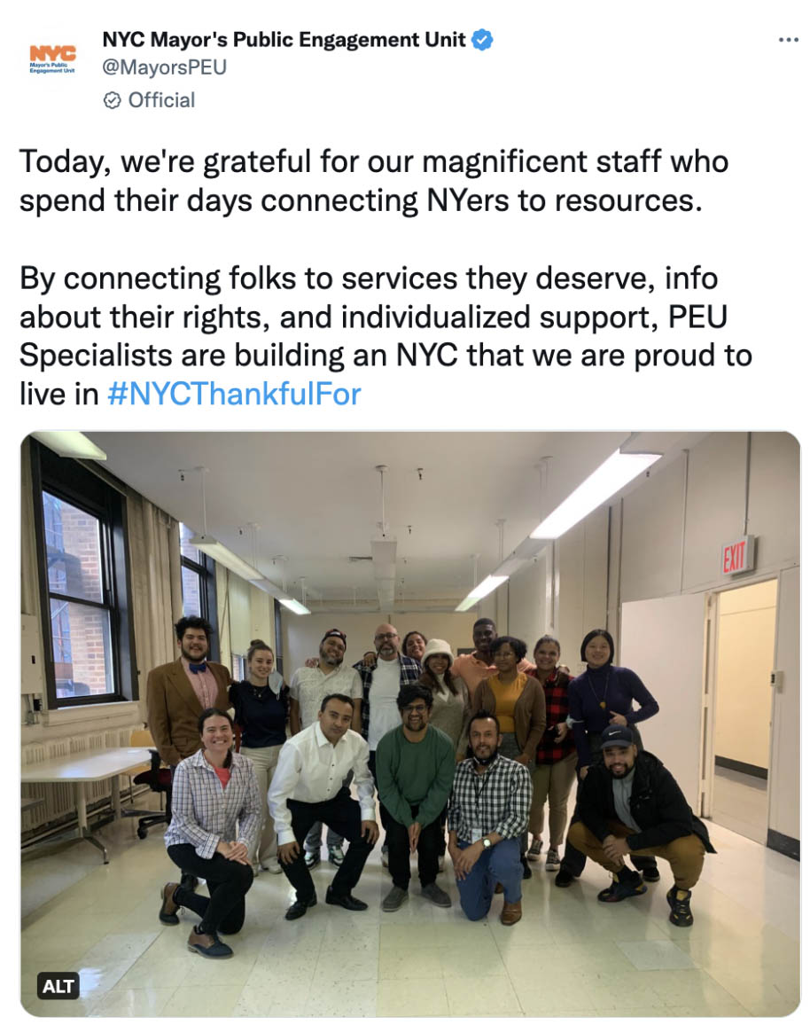 Screenshot from twitter that reads Today, we're grateful for our magnificent staff who spend their days connecting NYers to resources. By connecting folks to services they deserve, info about their rights, and individualized support, PEU Specialists are building an NYC that we are proud to live in #NYCThankfulFor. Attached picture to text is that of staff standing smiling in a group, inside an office space, to pose for a photo.