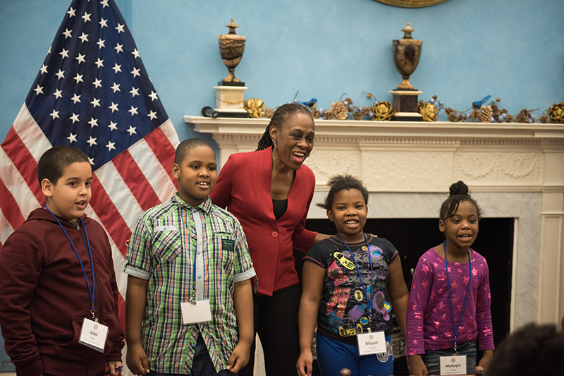 First Lady Chirlane McCray posing with children for picture