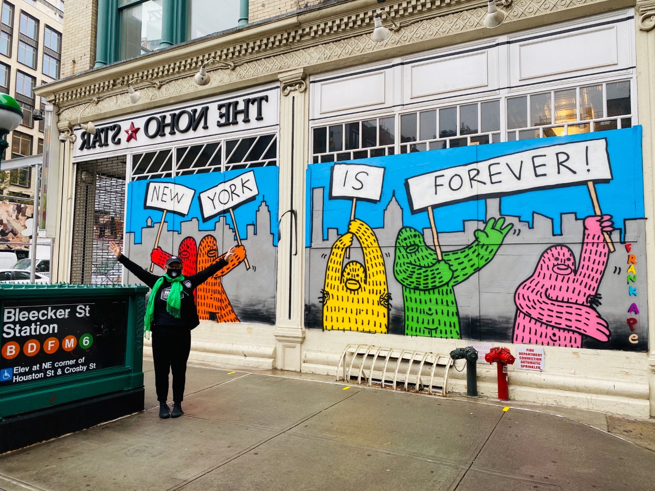 storefront of closed store by the Bleecker Street Station in Manhattan with artwork that says New York is Forever