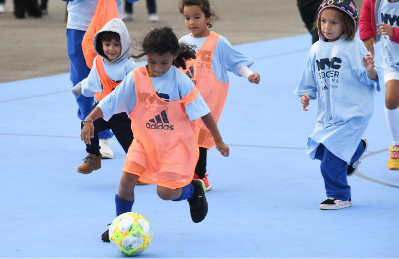 Photo of youths playing soccer