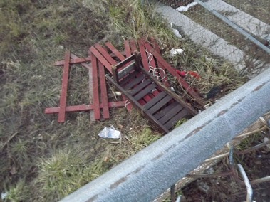 The piece of fence the firefighters used as a raft and ladder to rescue victims.