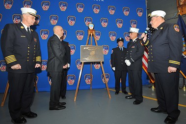 The centennial plaque is dedicated.